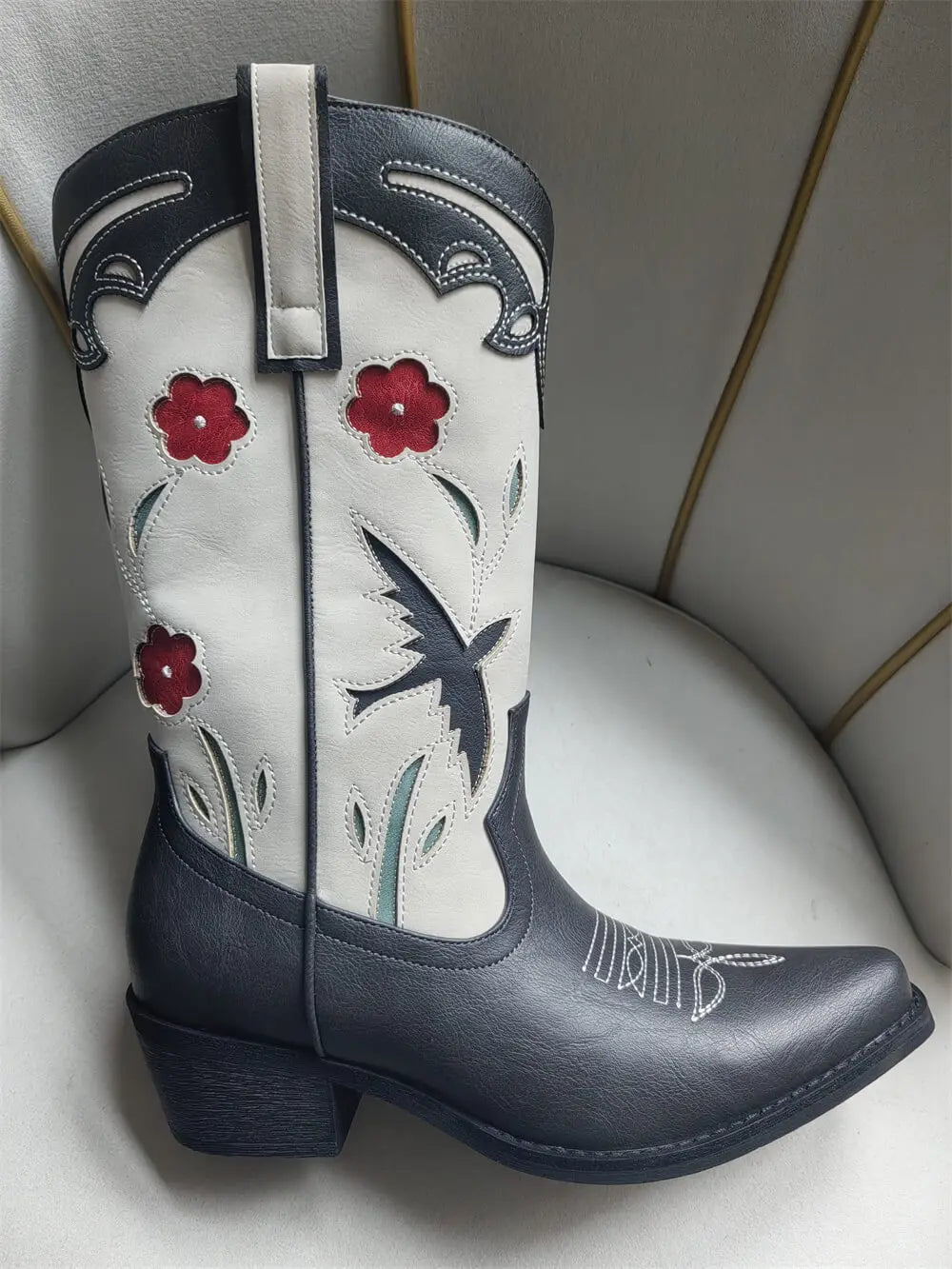 Pointed toe embroidered floral western boots in charcoal.