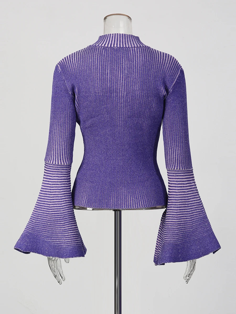 Purple ribbed top with bell sleeves on a mannequin against a white background