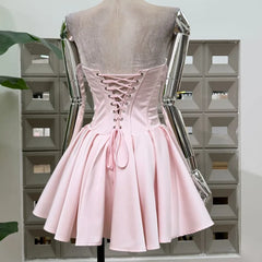 Pink strapless corset fit and flare dress back view