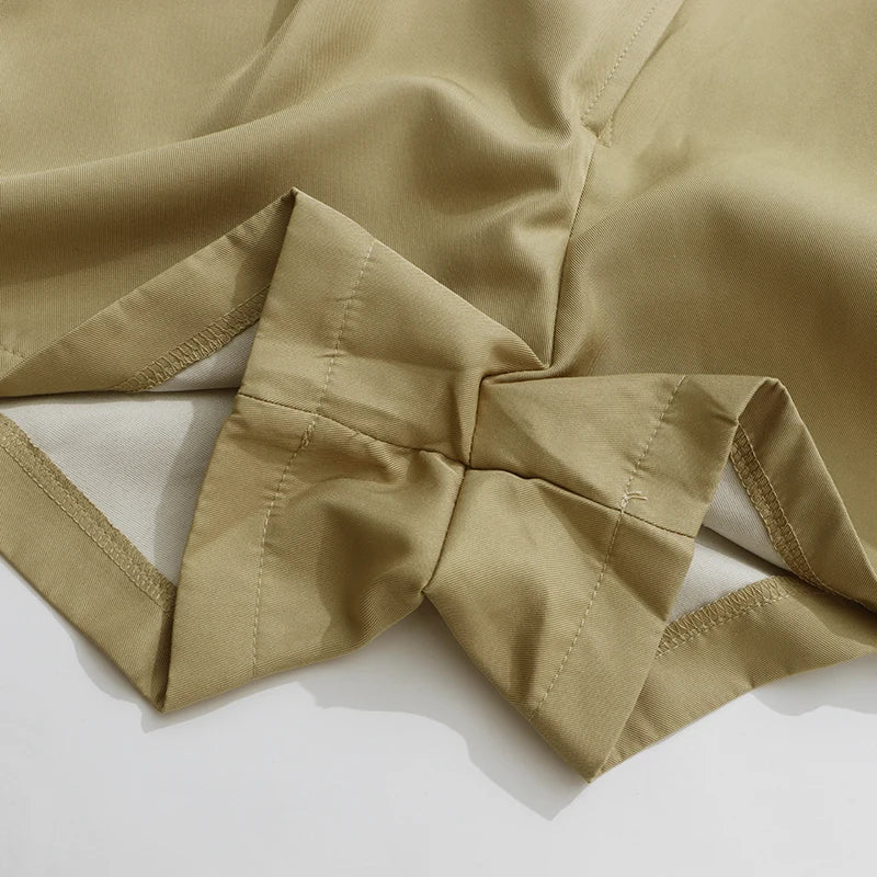 Close-up of beige fabric with a bow on a white background