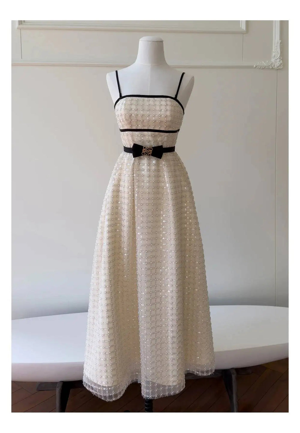 Strapless sequin midi dress on mannequin