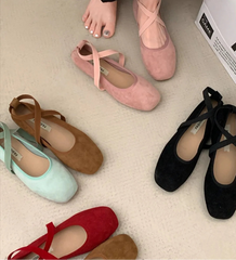 Assortment of square toe ballet flats in various colors including pink, brown, black, red, and green