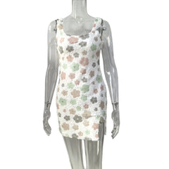 Floral patterned dress on a mannequin against a white background