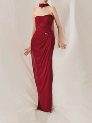 Red draped strapless maxi dress with metal buckle accent