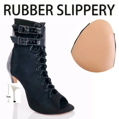 Black high-heeled lace-up boot with a tan insole and text 'Rubber Slippery' on a white background.