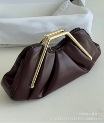Brown handbag with gold handle