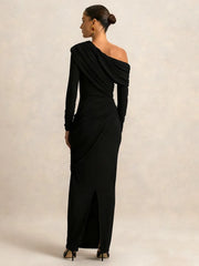 Black one-shoulder evening gown on a plain background