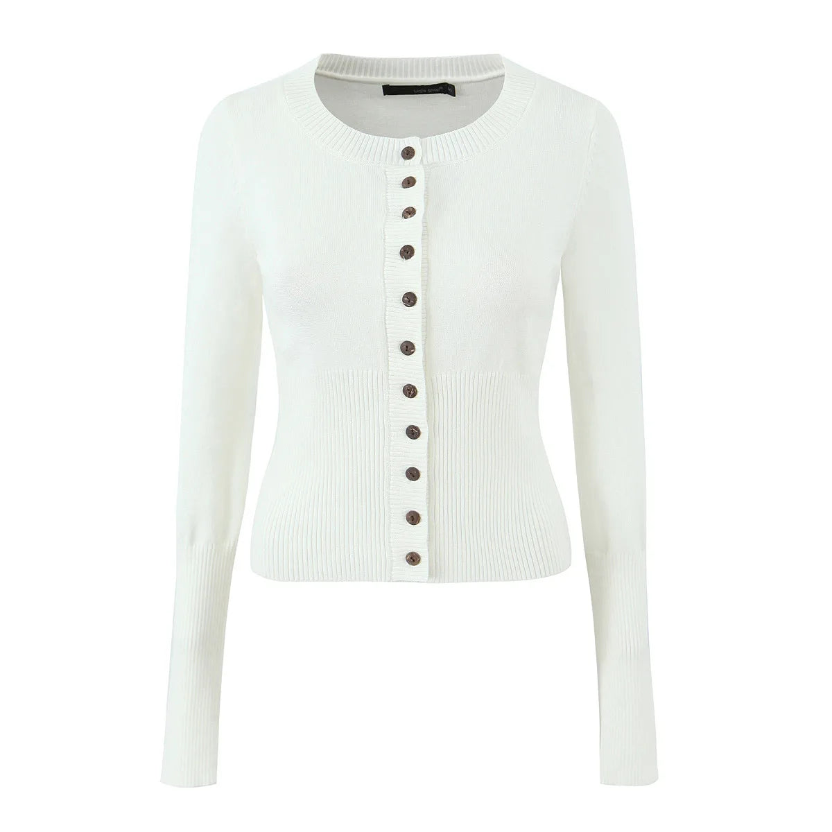 White cardigan with brown buttons on a white background