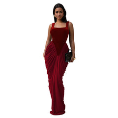 Woman wearing a red evening gown on a white background