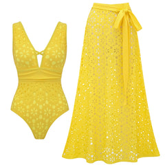 Yellow eyelet one-piece swimsuit with a V-neck and criss-cross detail, alongside a matching yellow eyelet maxi skirt with a tie waist.