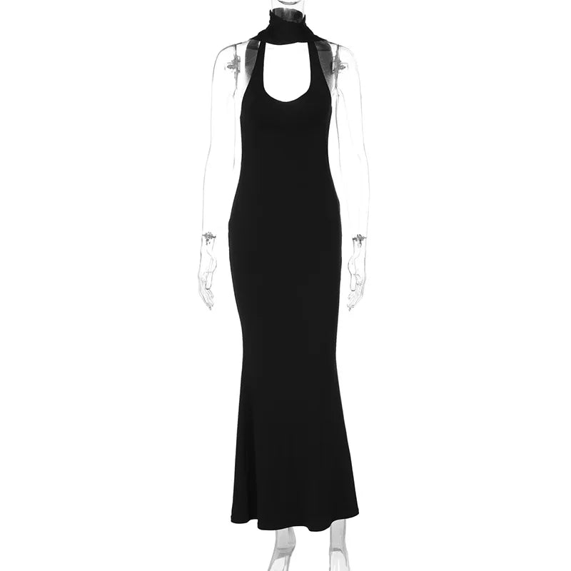 Black halter neck dress on a mannequin against a white background