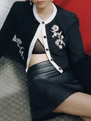 Black cardigan and midi skirt co-ord with contrast buttons