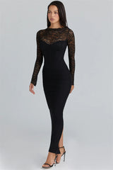 Woman wearing a black dress with lace sleeves on a gray background