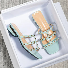 Blue studded block heel slide sandals