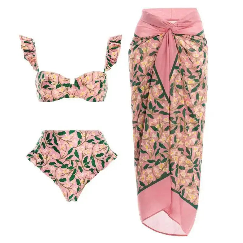 Floral print bikini top and high-waisted bottoms with matching beach skirt