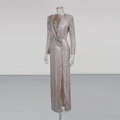 Silver sequin evening gown on a mannequin against a plain background