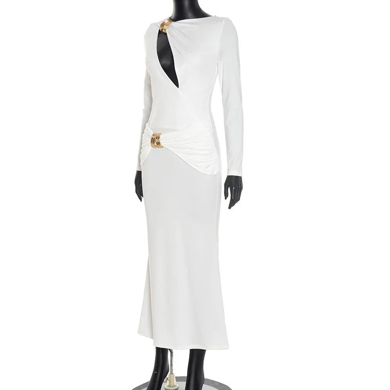 White dress with black accents on a mannequin against a white background