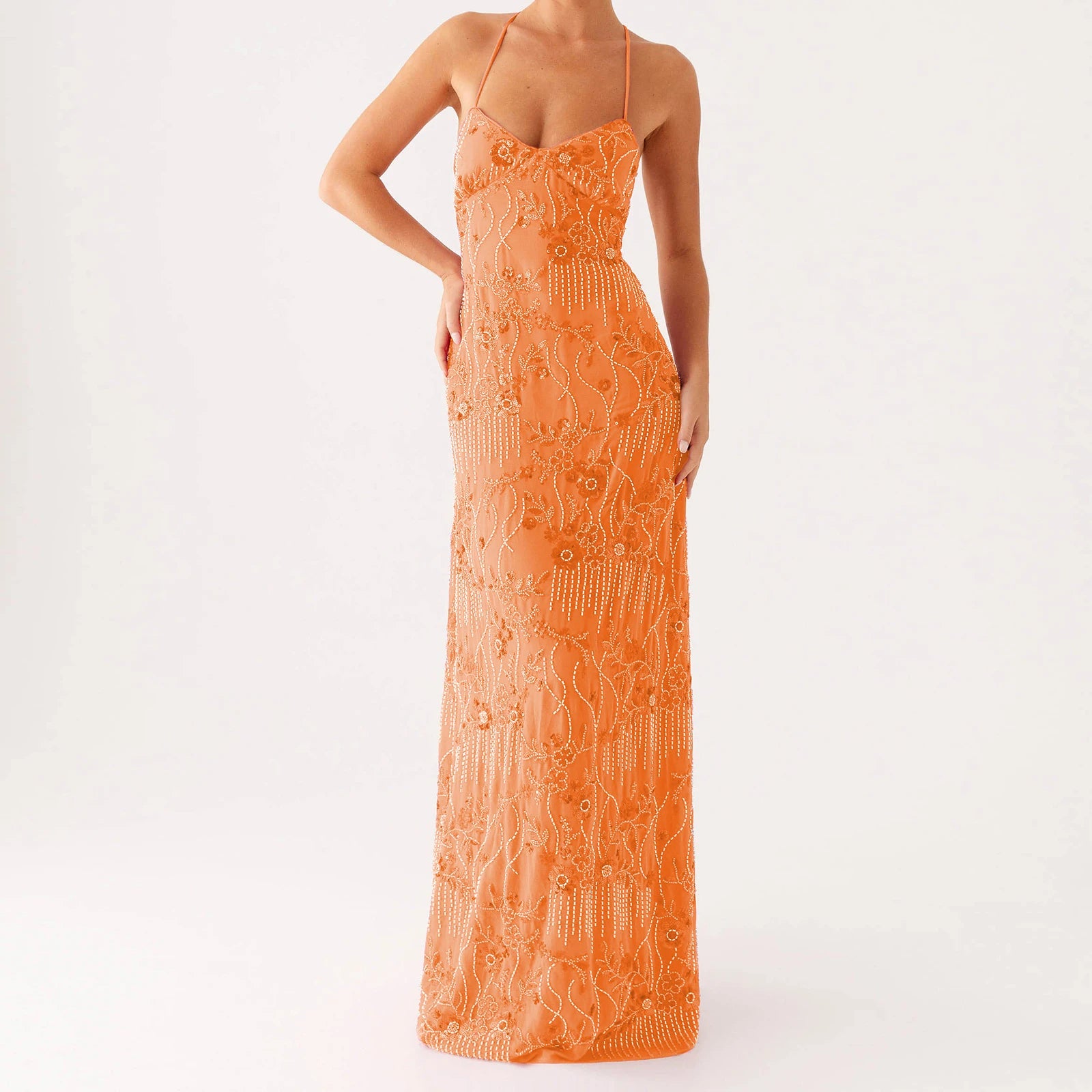 Orange lace dress on a white background