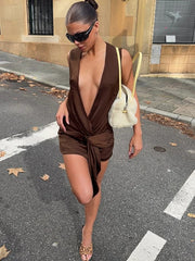 Brown v-neck knot front mini dress on street