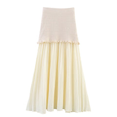 Two-tone skirt with knitted top and sheer skirt on a white background