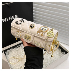 Quilted Embellished Barrel Bag