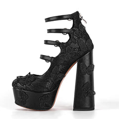 Black lace high-heeled shoe with butterfly designs on a white background