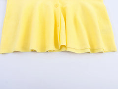 Yellow dress on a light gray background