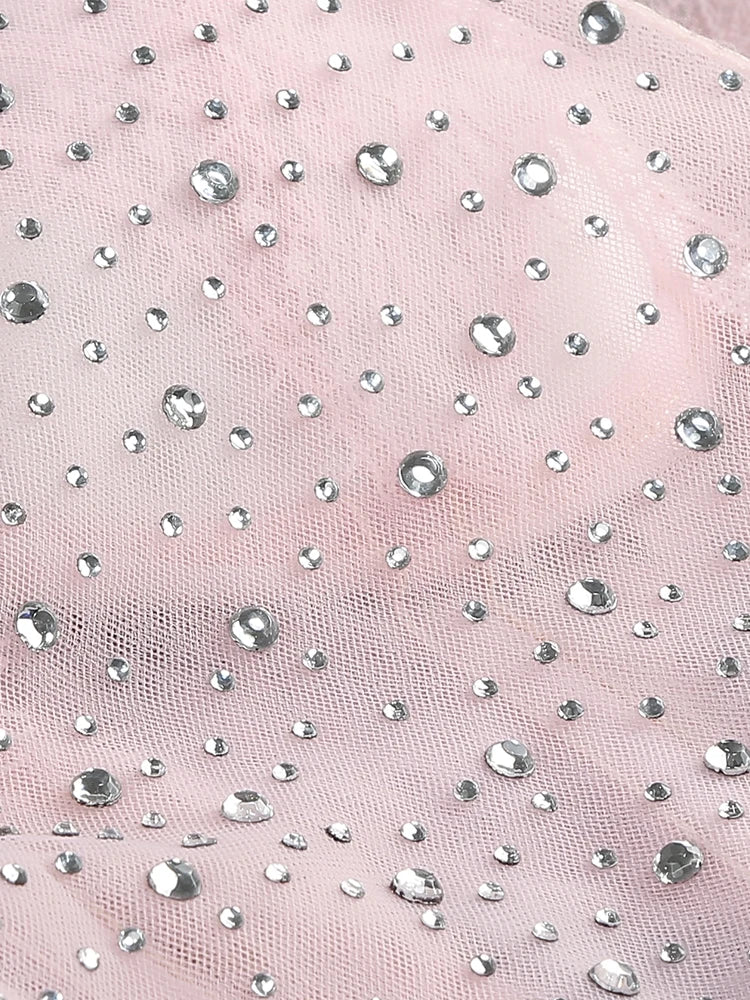 Pink fabric with silver rhinestones