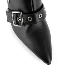 Close-up of pointed toe buckle strap stiletto boots toe detail