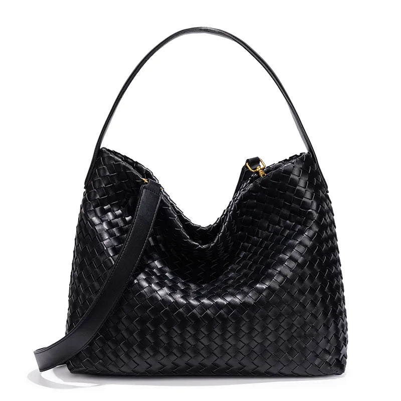 Black woven handbag on a white background