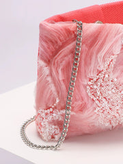 Pink marble handbag with sequins and a chain strap