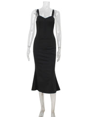 Black dress on a mannequin against a white background