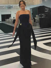 Black strapless draped maxi dress with long sash details