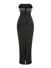 Black strapless jumpsuit with silver bead embellishments on a white background