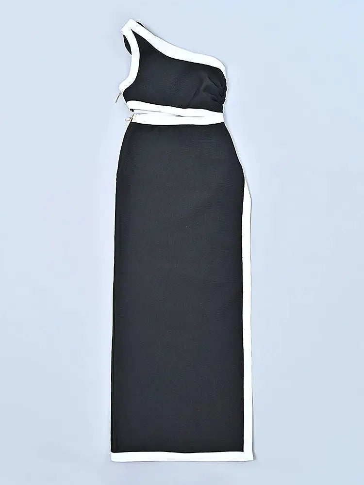 Black one-shoulder dress with white accents on a light blue background