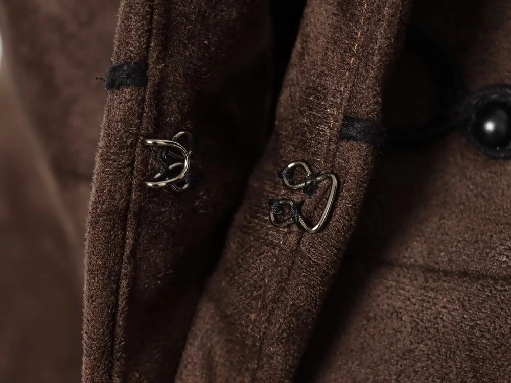 Close-up of hook and eye closure on vest top