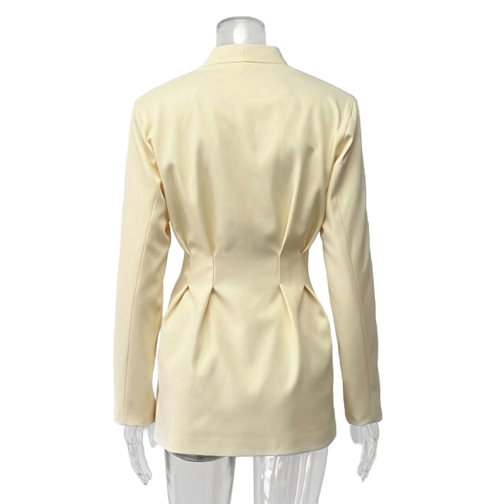 Beige blazer on a mannequin against a white background