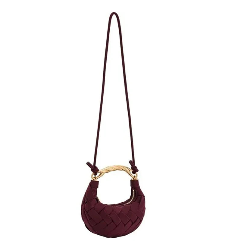 Woven faux suede top on a strap.