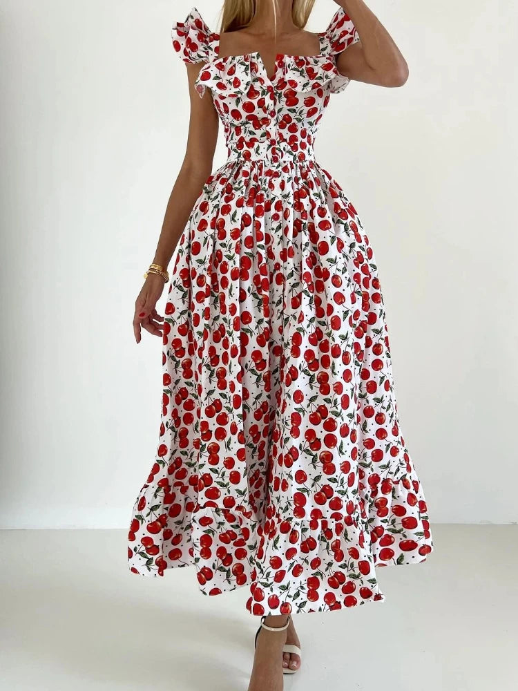 Woman wearing a red and white floral dress on a white background