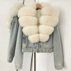 Denim jacket with white fur trim on a mannequin against a white background