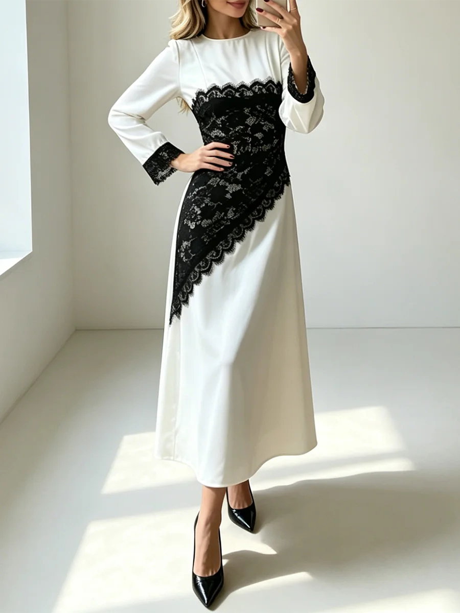 Full body shot of a black lace panel long sleeve midi dress.