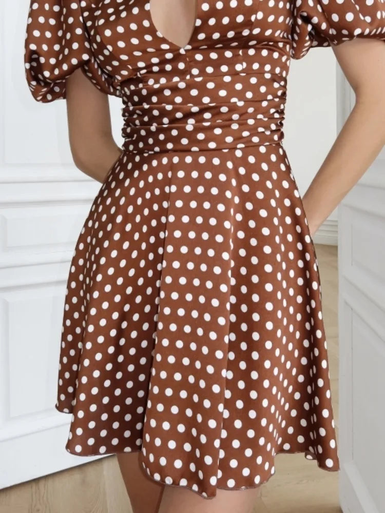 Polka dot keyhole neck puff sleeve dress waist detail