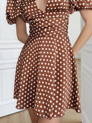 Polka dot keyhole neck puff sleeve dress waist detail