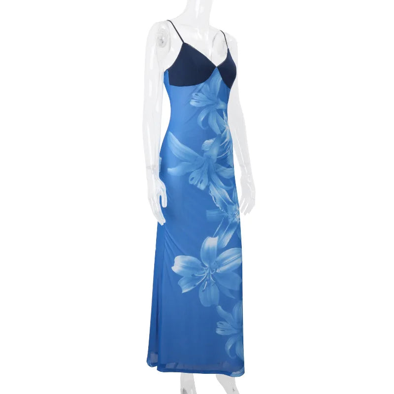 Blue floral dress on a mannequin against a white background