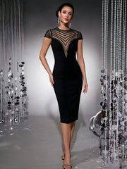 Black sheath midi dress with a sheer mesh yoke featuring chevron beading and cap sleeves, front view.