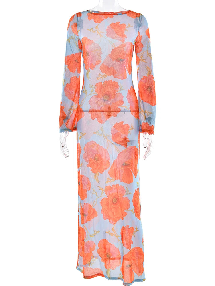 Floral patterned dress with orange flowers on a light blue background