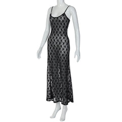 Black lace dress on a white mannequin against a white background