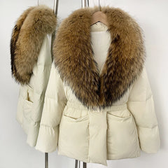 White puffer jacket with a large brown fur collar