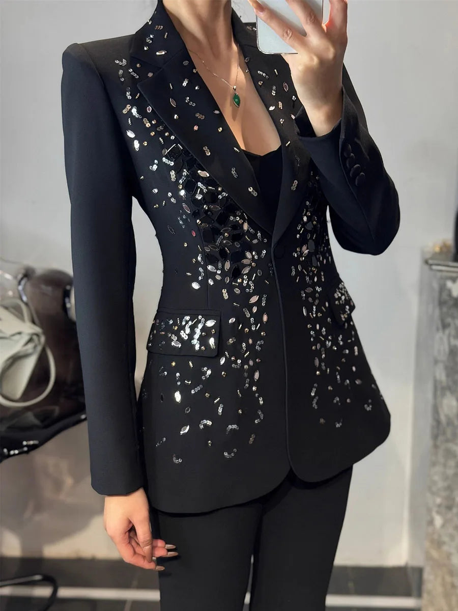 Elegant women's black co-ord with high-waist pants and shimmer blazer