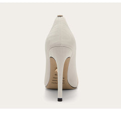 White high-heeled shoe on a white background
